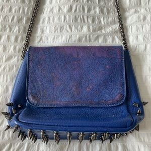 Blue leather studded + faux fur purse